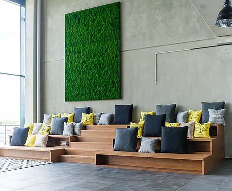 Meeting point under a moss wall: Greenhill installation at the Clinton European headquarters