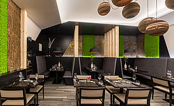 Evergreen moss walls by Freund in the interior design of a restaurant