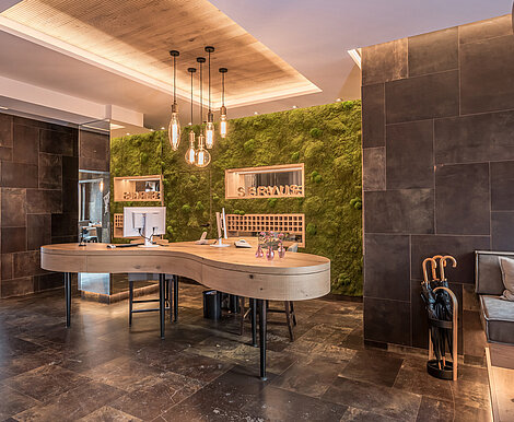 Freund Greenwood moss wall, wall panels with preserved forest moss combined with leather tiles, Boutique Hotel Munich