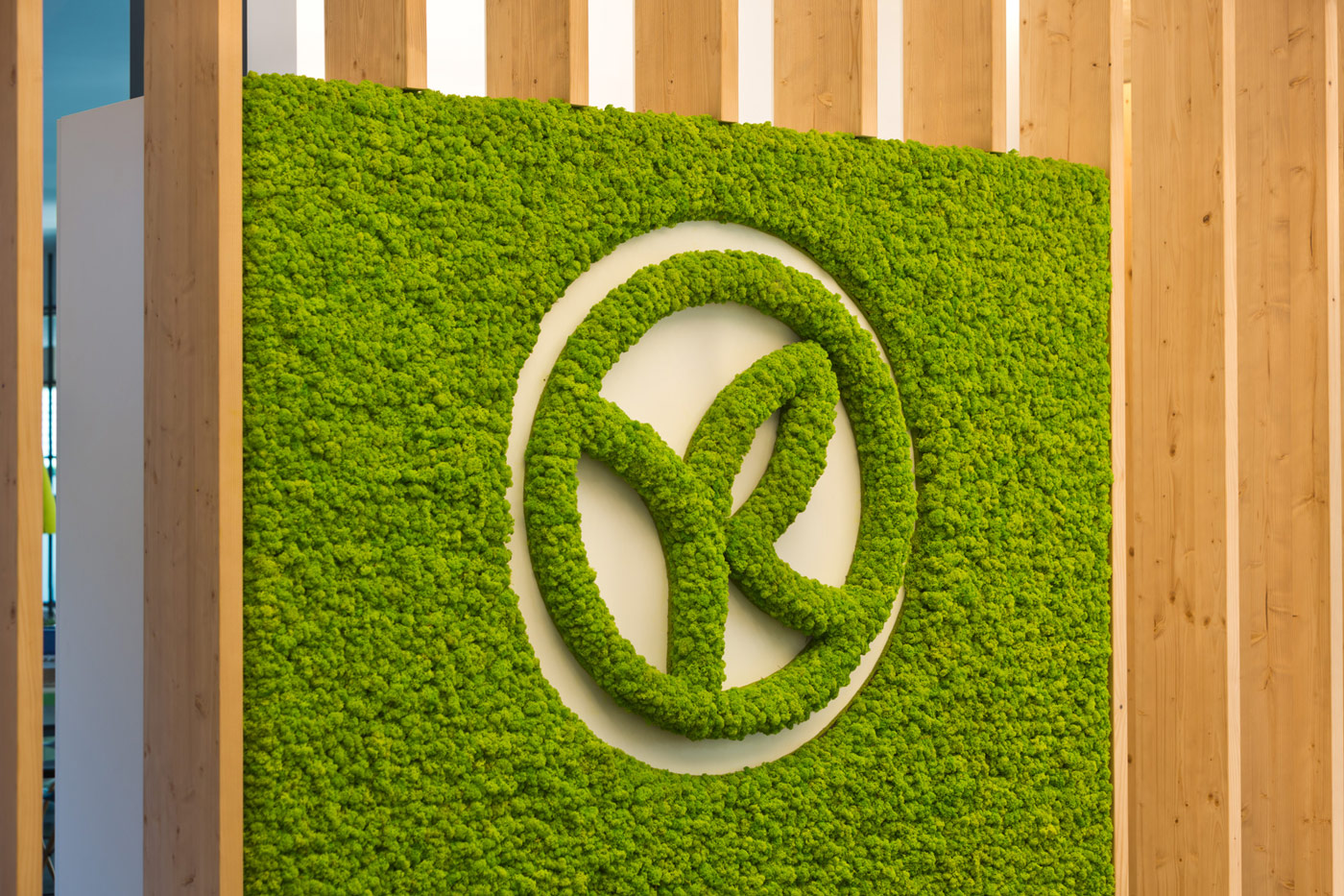 Apple green Evergreen Premium moss wall and moss logo, Yves Rocher office reception